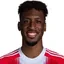 K. Coman